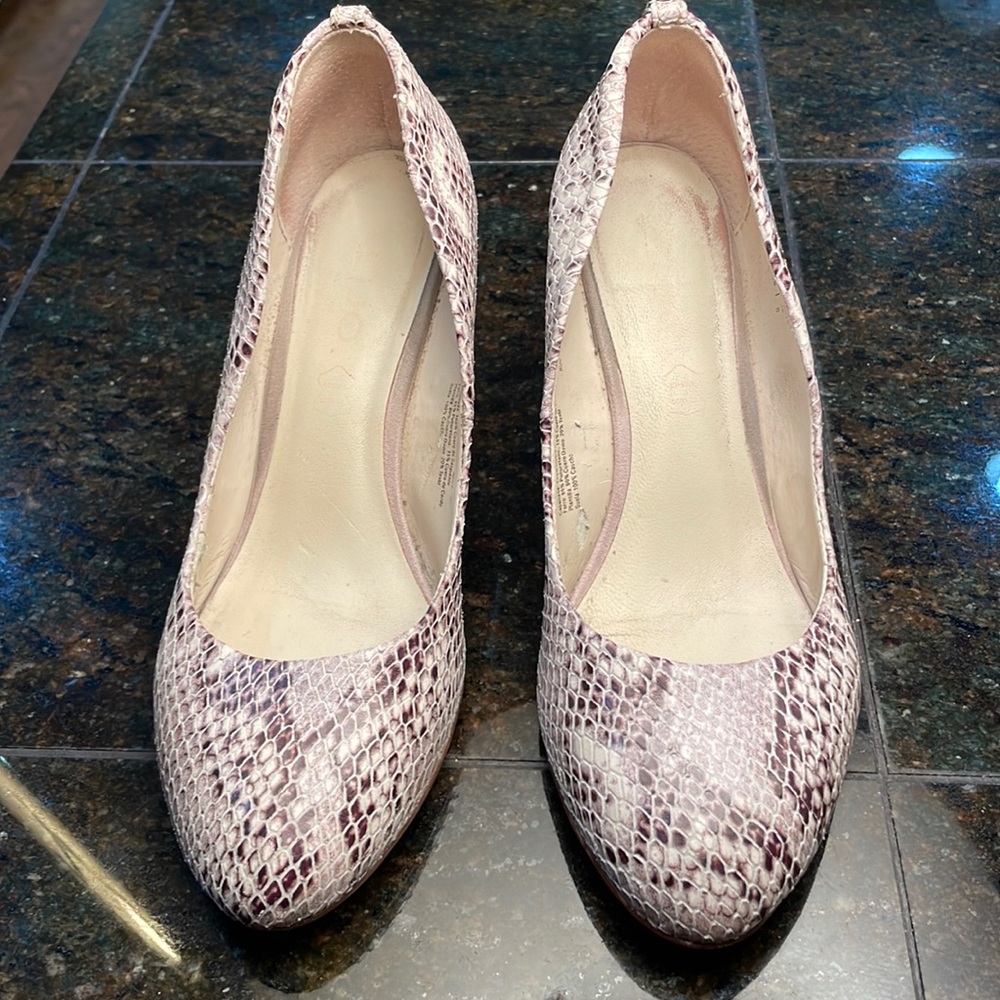 Aldo, 7.5 snake skin wedges. Lovely light tone.